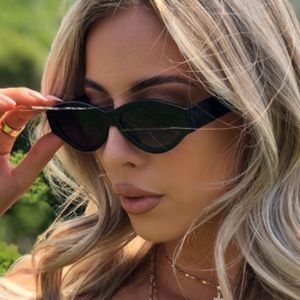 Black frame Sunglasses. Small lenses .